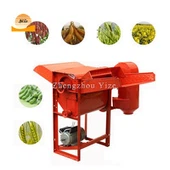 Nasi dan mesin thresher gandum